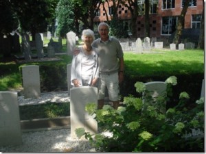 Anne Merrit and husband stood by her fathers grave at Hardenberg.